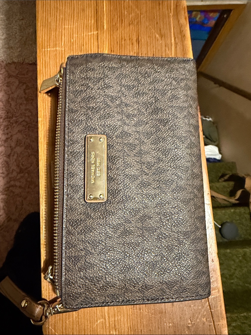 Michael kors brown and tan wallet with tag still inside.